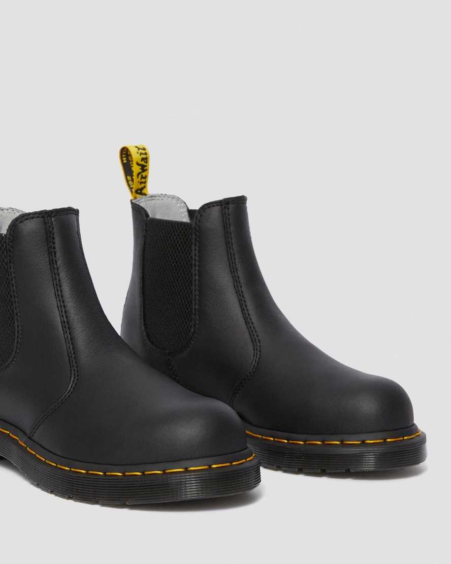 stivali da lavoro da donna dr. martens arbor newark con punta in acciaio neri