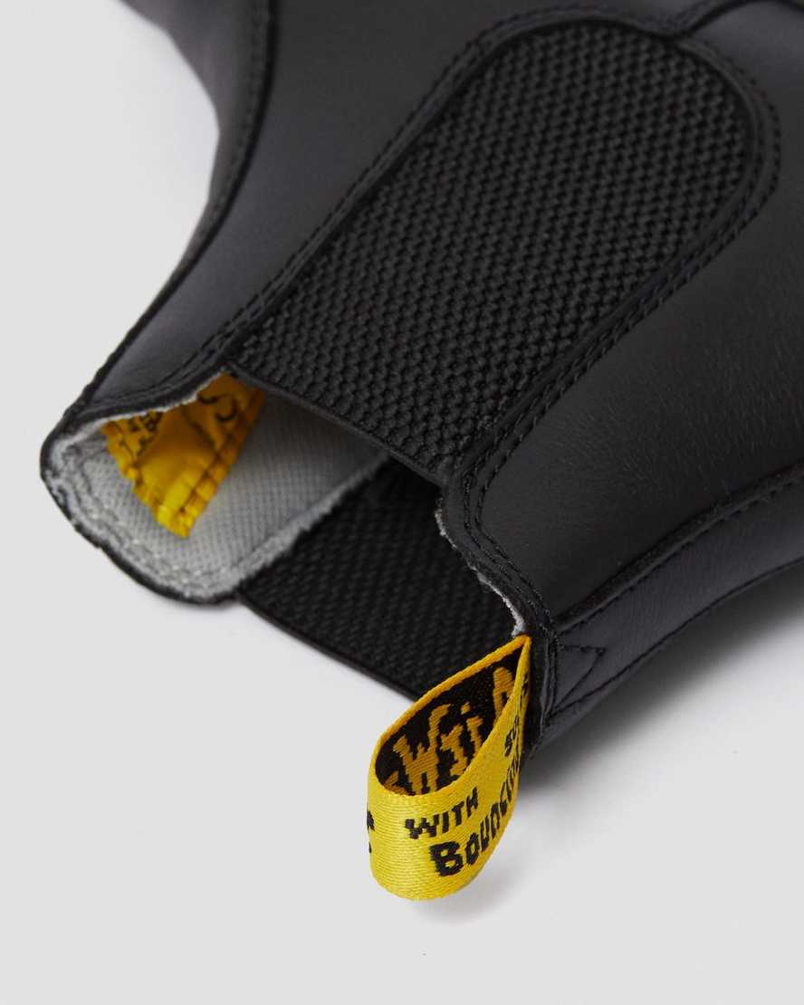 stivali da lavoro da donna dr. martens arbor newark con punta in acciaio neri