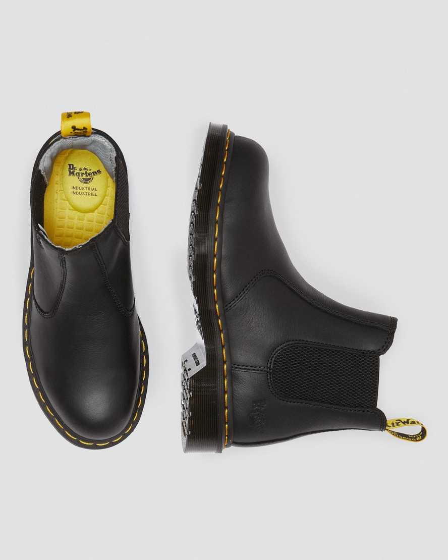 stivali da lavoro da donna dr. martens arbor newark con punta in acciaio neri